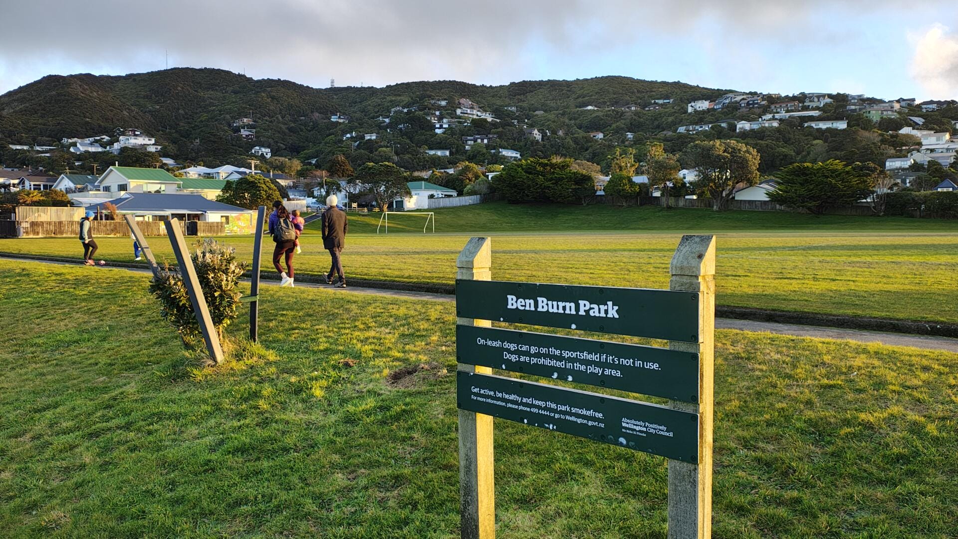 Ben Burn Park sign beside grassy sports field