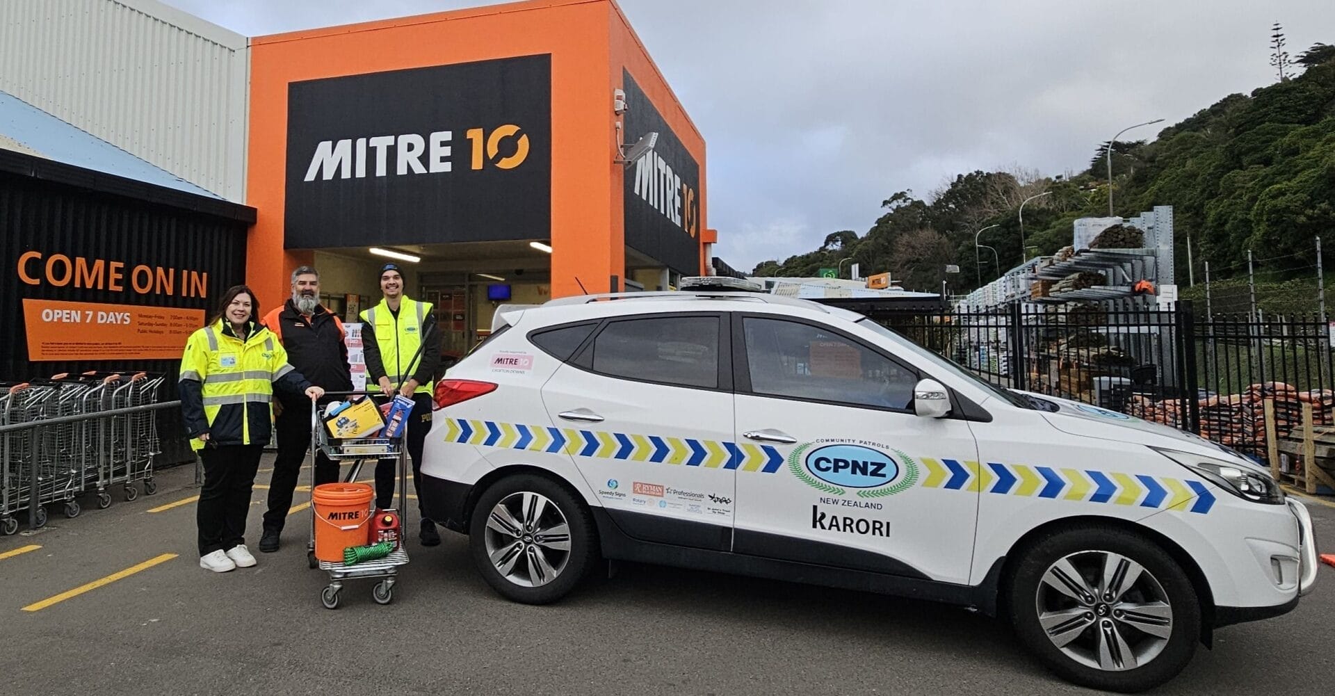 Community patrol car outside Mitre 10 store