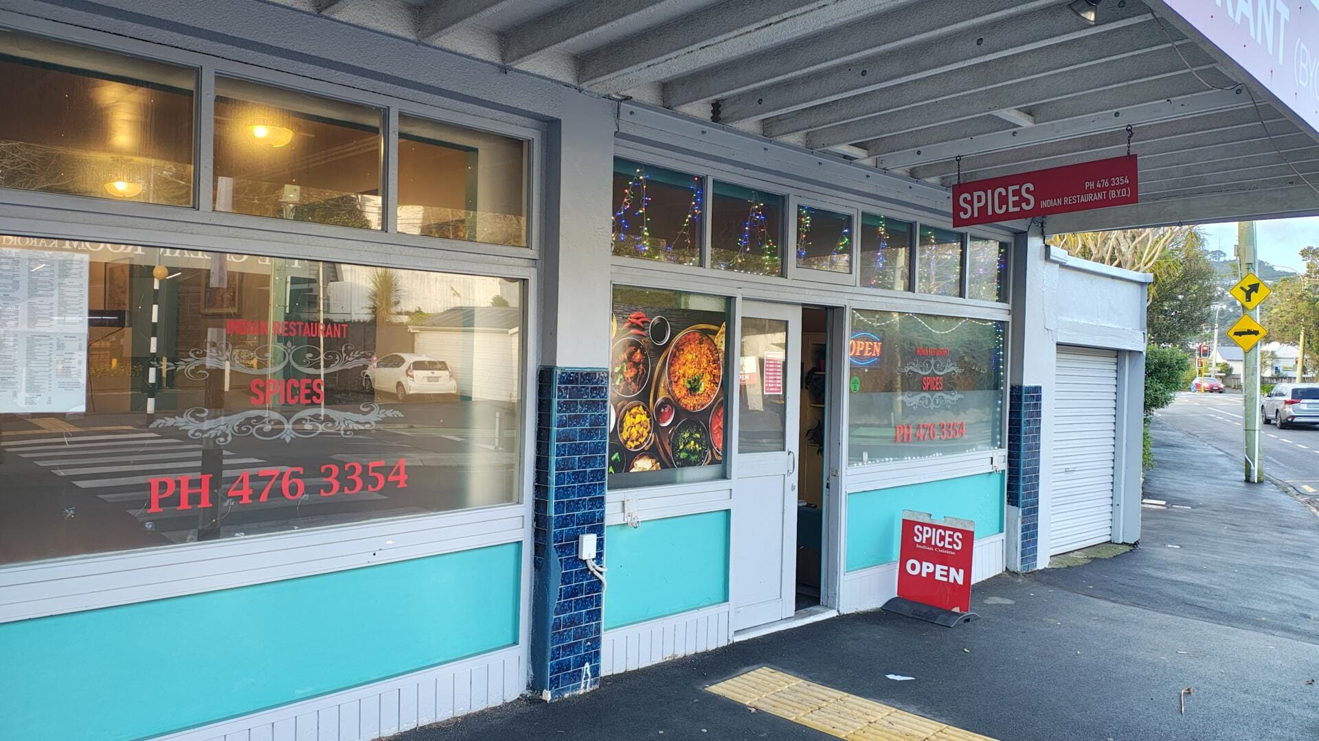 Exterior of Spices Indian restaurant on street