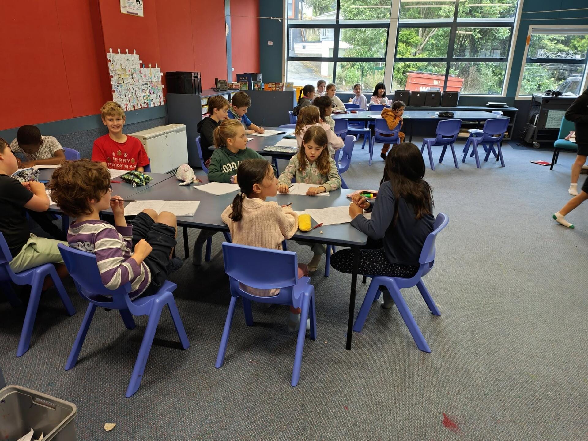 Primary school students working together in classroom