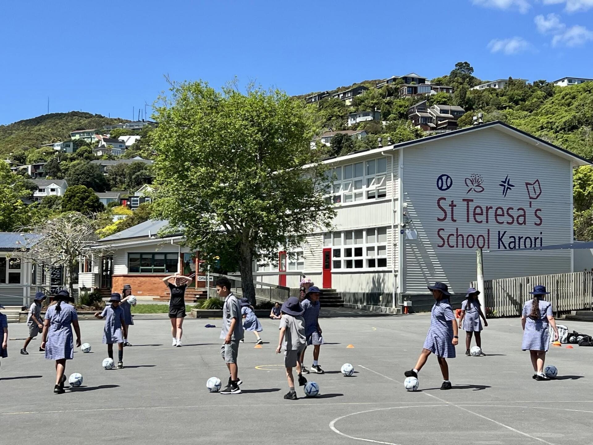 Children playing football at St Teresa's School