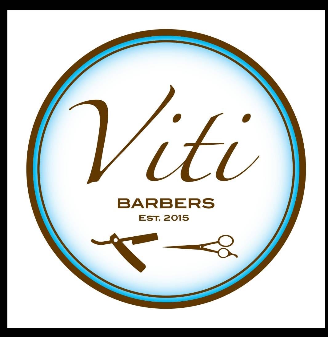Viti Barbers circular logo with razor and scissors